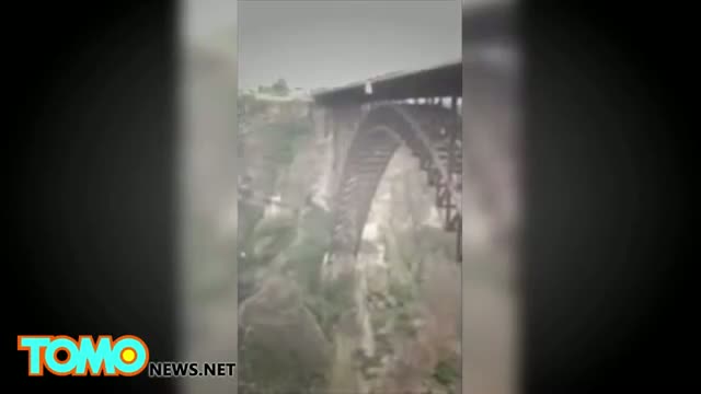 Watch BASE jumper killed in 'burning parachute' stunt gone wrong at Idaho's Perrine bridge Video