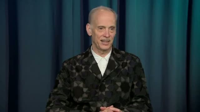 Watch John Waters Still Itching to Do Hitchhiking Video