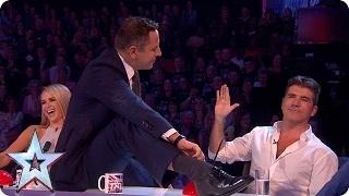 Watch David gets up close and personal with Simon | Semi-Final 2 | Britain's Got Talent 2015 Video