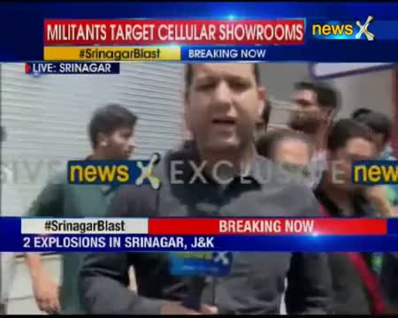 Watch Srinagar Grenade Attack: Militants throw grenades at Vodafone, Aircel outlets in Srinagar Video