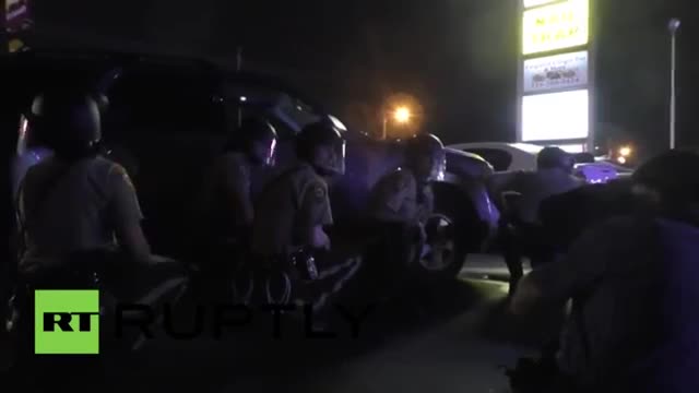 Watch Chaos in Ferguson as gunfire interrupts Michael Brown anniversary Video
