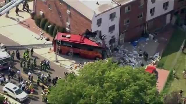 Watch Bus Shears Off Part Of Queens Building Video