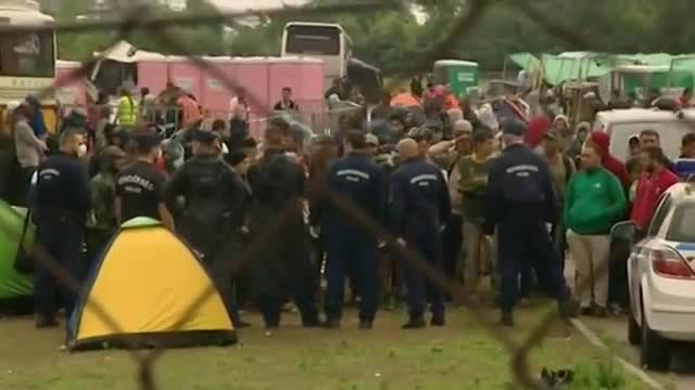 Watch Hungary Police Use Tear Gas on Migrants Video