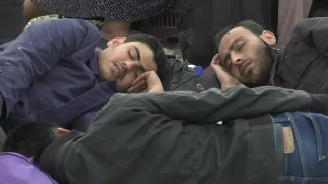 Watch Migrants Pour Into Macedonian Border Town Video