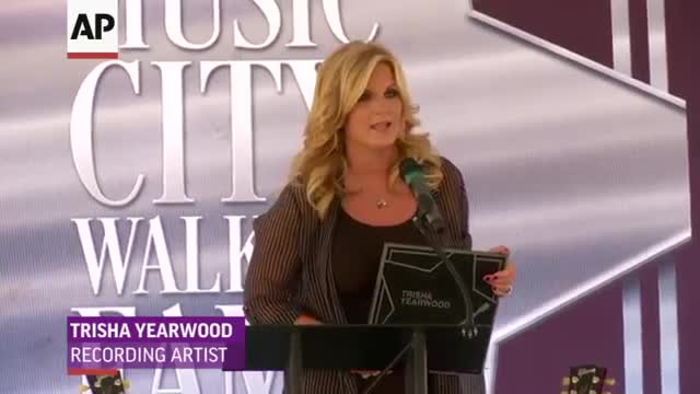 Watch Garth, Trisha Yearwood Get Stars in Nashville Video