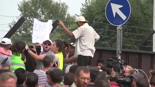 Watch Migrants Protest Hungary's Border Closure Video