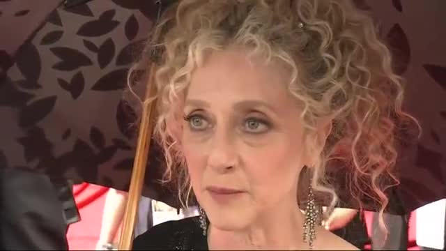 Watch Stars Try to Stay and Look Cool on Emmy Carpet Video