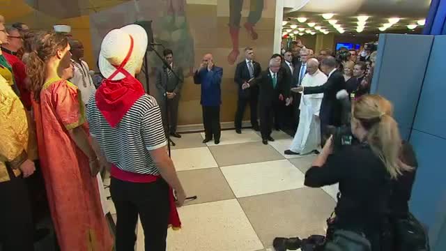 Watch Choir sings to Pope after UN address Video