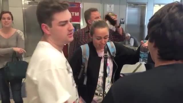 Watch Miley Cyrus Arrives in New York Wearing Zit Cream Video