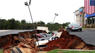 Watch Cars fall into giant hole at Mississippi IHOP parking lot, experts say not a sinkhole - TomoNews Video