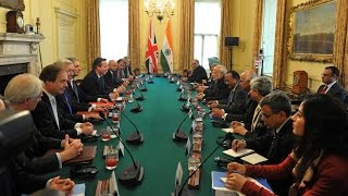 Watch PM Modi meets PM Cameron for delegation level talks Video