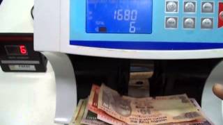 Watch TALKING VALUE NOTE COUNTING MACHINE ALONG WITH THE FAKE NOTE DETECTOR- PARAS Video