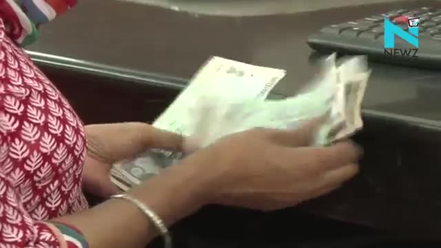 Watch Rupee down 13 paise to 66 72 against dollar Video