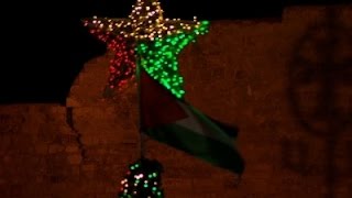 Watch Giant Christmas Tree Lit Up in Bethlehem Square Video