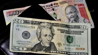 Watch Rupee gains 11 paise on Monday trade against dollar Video