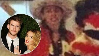 Watch Miley Cyrus & Liam Hemsworth Caught Kissing At A Music Festival Video