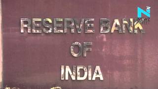 Watch RBI sets Re reference rate at 66.9115 against dollar Video