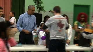 Watch Obamas Perform Community Service on MLK Day Video