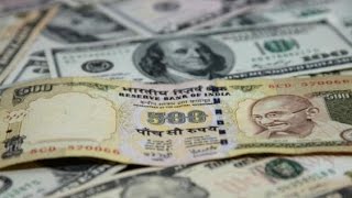 Watch RBI sets rupee reference rate at 67.6728 against USD Video