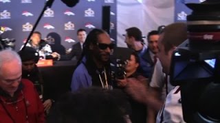 Watch 'Reporter' Snoop Dogg Visits Panthers, Broncos Video