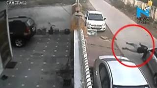 Watch CCTV footage captures speeding car tosses man to death Video