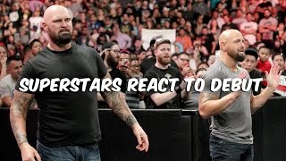 Watch BulletClub hits WWE? Superstars react to Gallows and Anderson's debut: April 13, 2016 Video