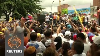 Watch Opposition protesters rally in Caracas against Maduro Video
