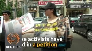 Watch Chinese protesters deliver biggest ever petition against Yulin's dog meat festival Video