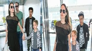 Watch Angelina Jolie was spotted sharing a tender moment with her son Knox while waiting in a queue at JFK Video