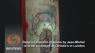 Watch Johnny Depp auctions Basquiat collection Video