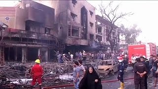 Watch Several dozen killed and wounded in twin Baghdad bombings Video