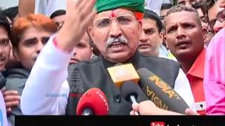 Watch Modi Cabinet reshuffle - New Minister Arjun Meghwal cycles to Rashtrapati Bhavan for oath taking Video