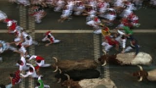 Watch First bull run of Spain's San Fermin festival Video
