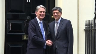 Watch Lew meets new British finance minister Hammond Video