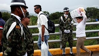 Watch Venezuela reopens Colombian border to allow people to buy basic goods Video