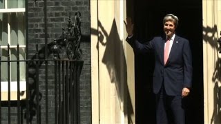 Watch John Kerry hit by 10 Downing Street door as he enters for talks Video