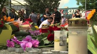 Watch Tributes for Munich mall shooting victims Video