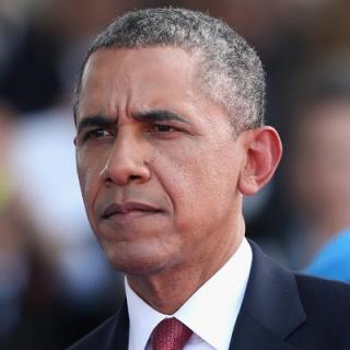 Watch Obama visits Paris attack site, pays tribute to victims Video