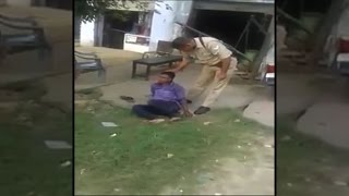 Watch On Cam: Police thrashes man in Uttar Pradesh Video