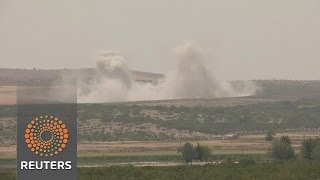 Watch Explosions rock Syrian border as Turkey presses operation Video