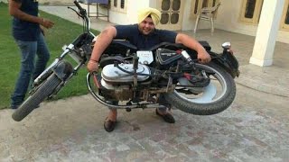 Watch CRAZY Indian Guys Lifted ROYAL ENFIELD Motorcycle On Their Head Video