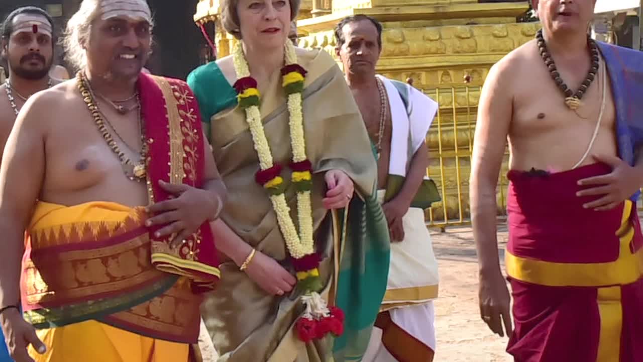 Watch British Prime Minister Theresa May wears a saari to Someshwara Temple Video