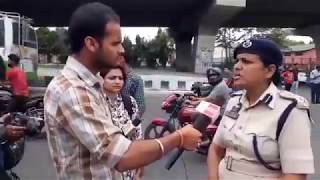 Watch J&K police distributes helmet to bikers riding without it in Jammu Video