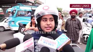 Watch Traffic Police distributes helmets Video