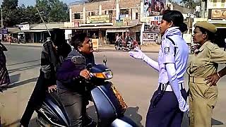 Watch #Viral video #Riding on Two wheeler with two  #caught by Traffic police Video