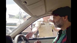 Watch Police detain JKLF chief Yasin Malik on his way to protest march Video