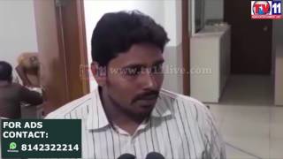 Watch SI THREATENS MAN WITH GUN AT PET BASHEERABAD TV11 NEWS 11TH APR 2017 Video
