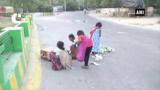 Watch Farmers begin 10-day strike, throws vegetables, spill milk on road Video