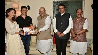 Watch BJP chief Amit Shah meets Bollywood actor Madhuri Dixit during campaign Video