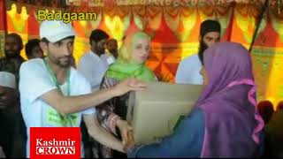 Watch Aasha Relief Trust distributes relief amoung orphans in khan sahab badgaam (by Touqeer Ganai) Video